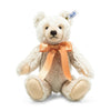 A plush Steiff Classic Mohair Teddy Bear with white mohair fur and an orange bow around its neck, sitting upright against a white background.