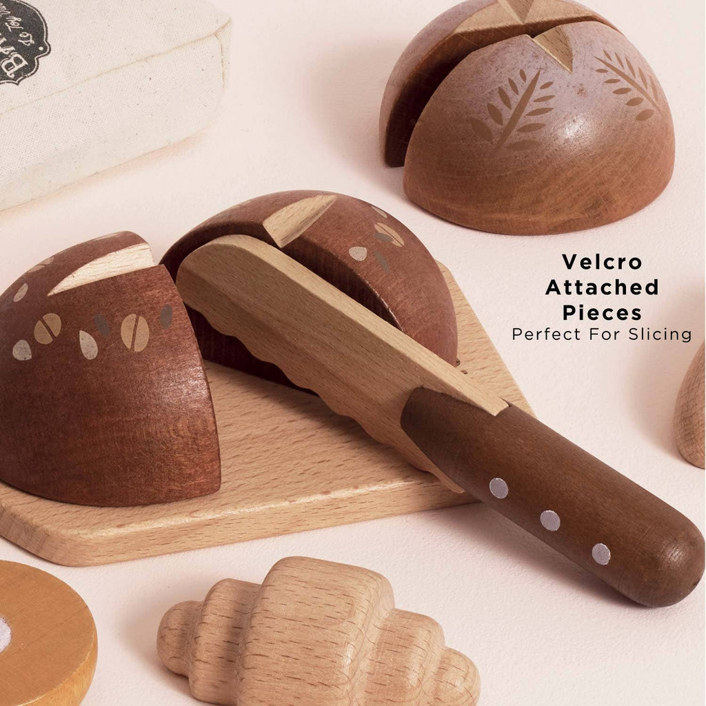 The Artisan Bread and Knife Set (ships in one week) includes Velcro-attached pieces perfect for slicing with a wooden knife on a cutting board, plus extra pretend bread and pastries to enhance kitchen role play fun.