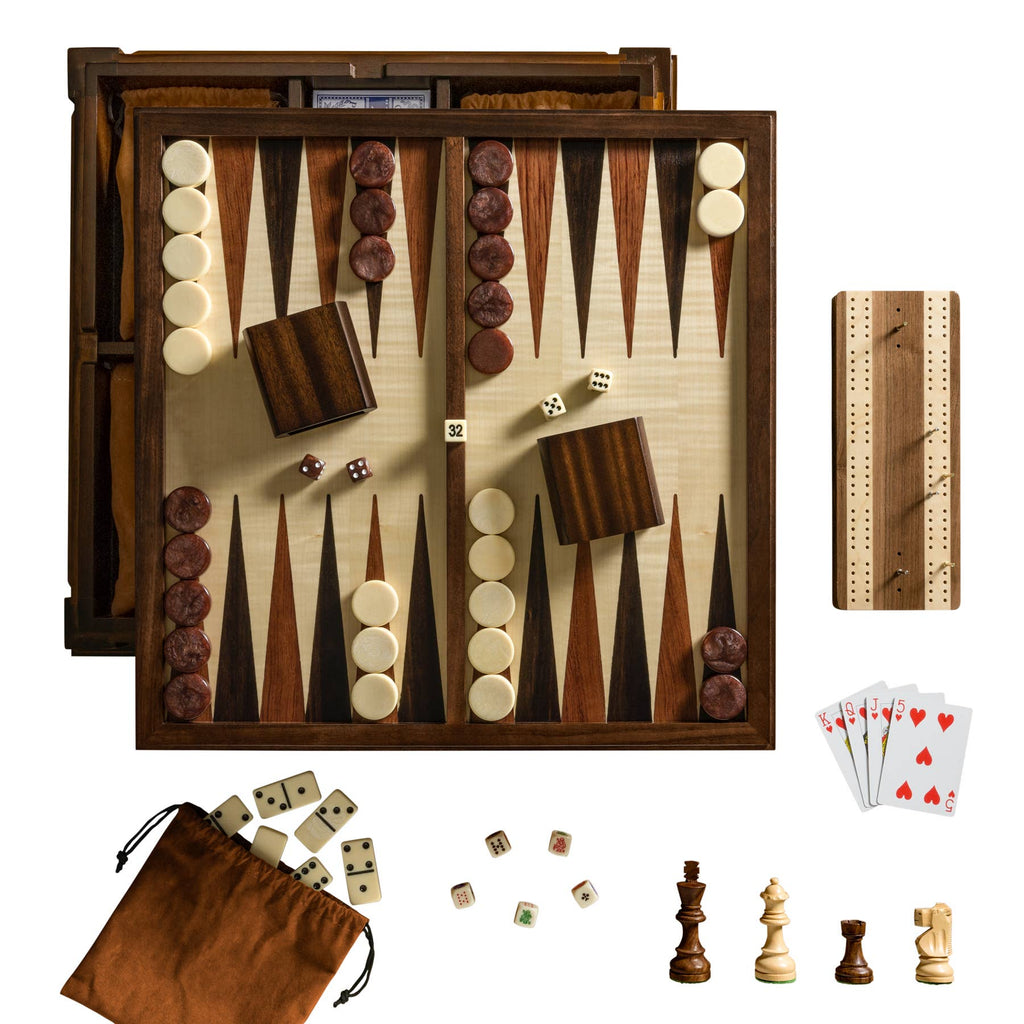 The Heirloom Edition: 7-in-1 set includes chess, checkers, backgammon, cribbage, poker dice, cards, and dominoes in a walnut cabinet with game pieces—beautifully arranged on a white background.