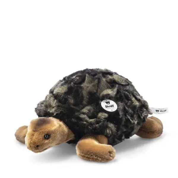 The Steiff Slo Tortoise Stuffed Animal features a soft, textured dark brown and green shell, light brown legs and head, and a small white "Steiff" tag—perfect for naptime cuddles. Set against a white background.