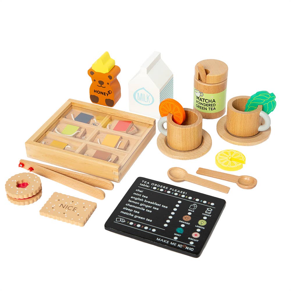 The Wooden Tea Set is a charming addition to any play space, featuring wooden cookies, a honey jar, milk carton, teacups, and a vibrant sectioned tray. It includes an organic Matcha Tea container, menu card, lemon slices, and a wooden spoon.