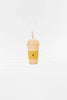 A Handmade Wooden Lemonade cup with a smiling sun logo and the word "smoothie" written below it, crafted using non-toxic water-based paint, placed on a white background with light shadows.