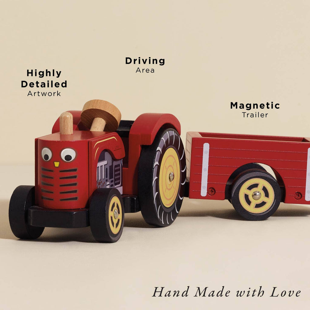 The Farmyard Tractor & Trailer is a red wooden toy with large wheels, detailed artwork, a spacious driving area, a removable driver, and a magnetic trailer—showcasing exceptional craftsmanship.