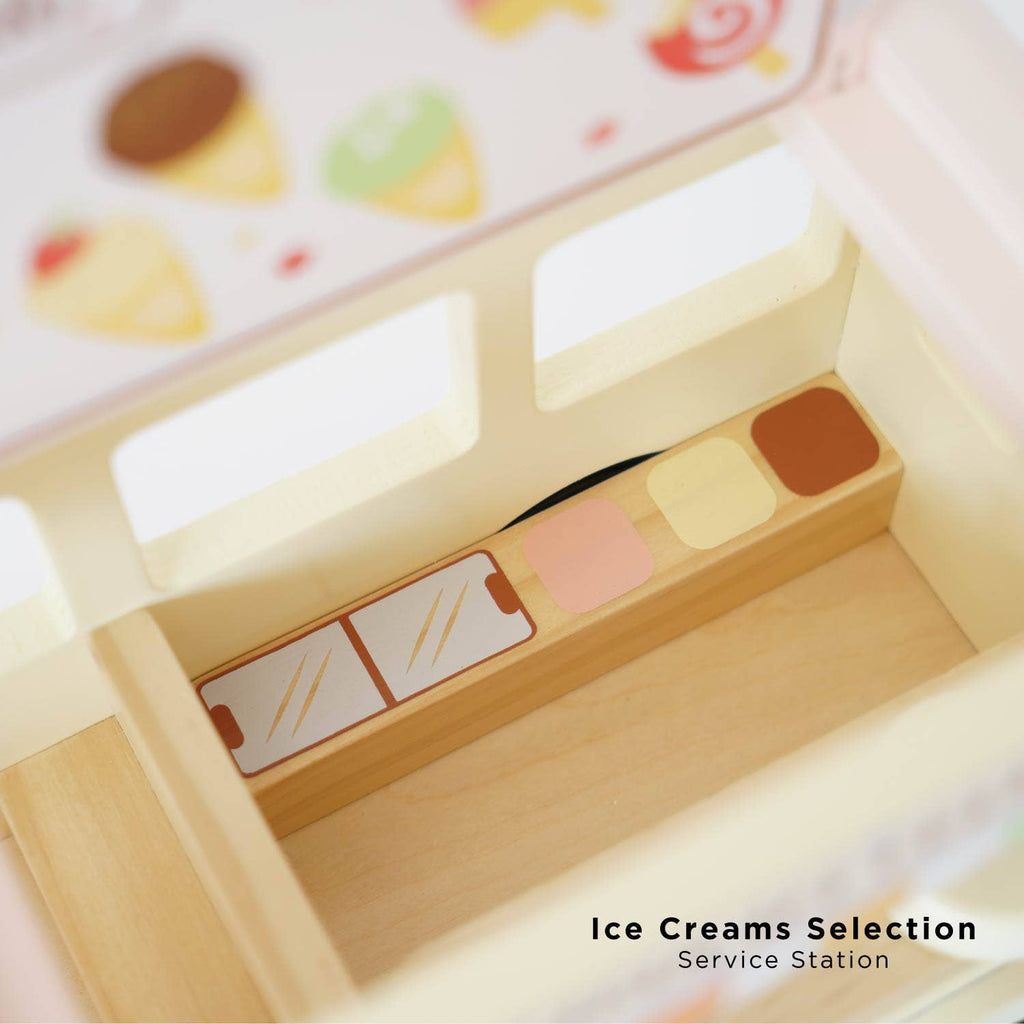 A close-up of the Wooden Ice Cream Van, a vintage-style toy with painted wooden compartments like ice cream tubs, beneath a sign with cone illustrations. Ships in one week.