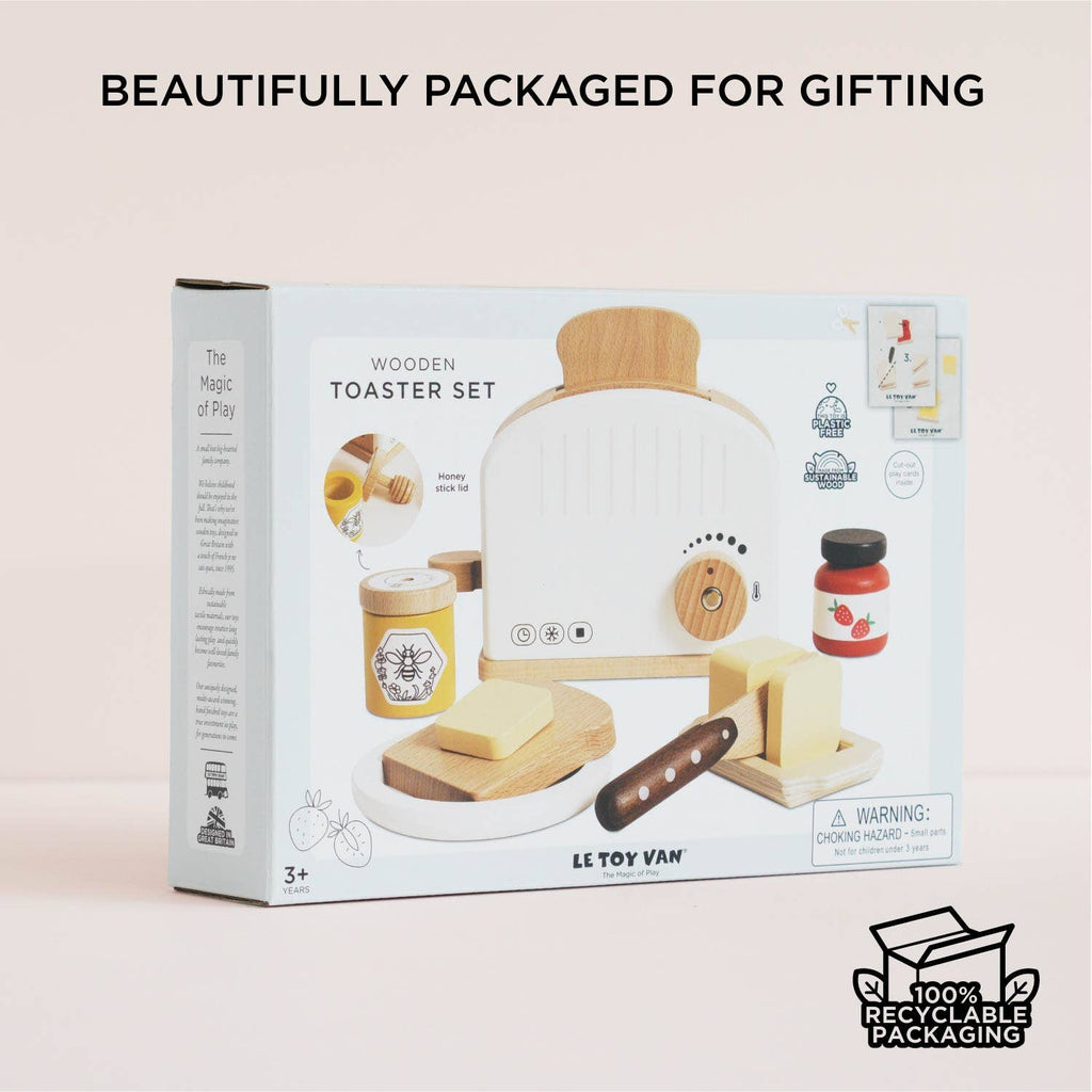 The Pop-up Toaster & Breakfast Set, made from FSC-certified wood for ages 3+, includes bread, butter, jam, and a knife. Ships in one week and comes in 100% recyclable packaging—perfect for pretend play and gifting.