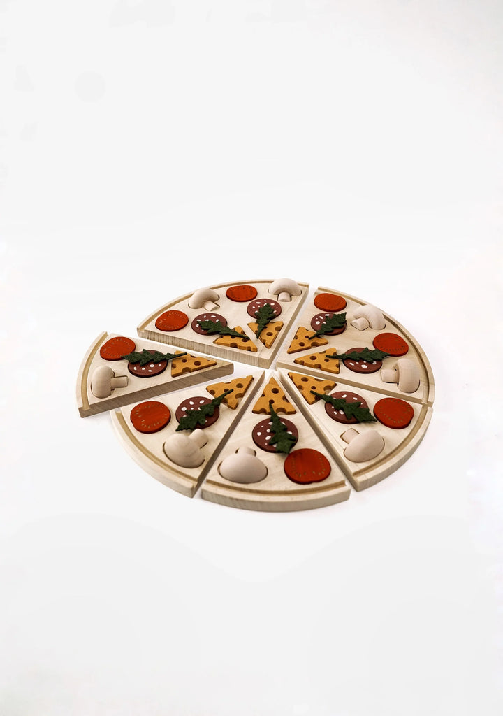 A Sabo Concept Wooden Pizza toy divided into slices, each decorated with colorful toppings such as pepperoni, mushrooms, and green peppers, on a white background.