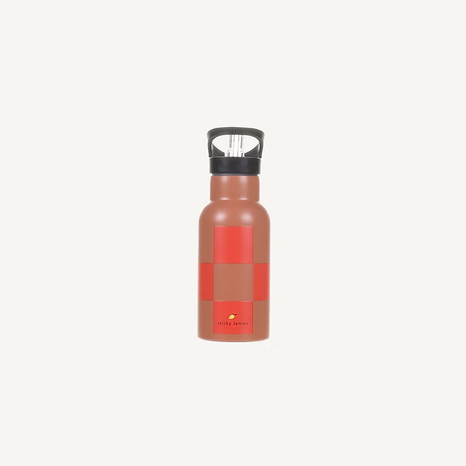 The Sticky Lemon Water Bottle | Farmhouse | Ladybird Red + Harvest Moon is a reusable stainless steel bottle with a geometric brown and red design, featuring a black screw-on lid with built-in handle, shown on an off-white background.