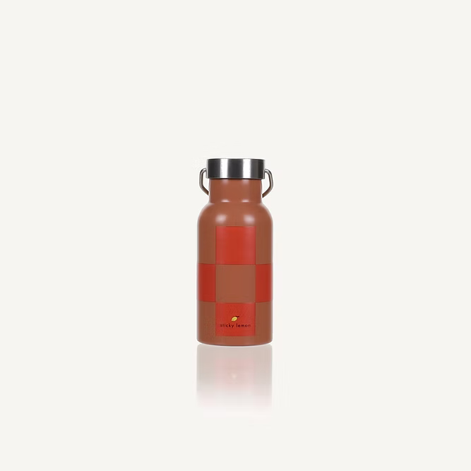 The Sticky Lemon Water Bottle | Farmhouse | Ladybird Red + Harvest Moon features a stainless steel body with a red and brown checkered pattern, silver cap, and handle, shown standing upright on a white background.