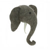 A handcrafted Handcrafted Felt Elephant with Tusks Wall Decor - Mini with large ears and a curled trunk, featuring black eyes and a white tusk, on a plain white background.