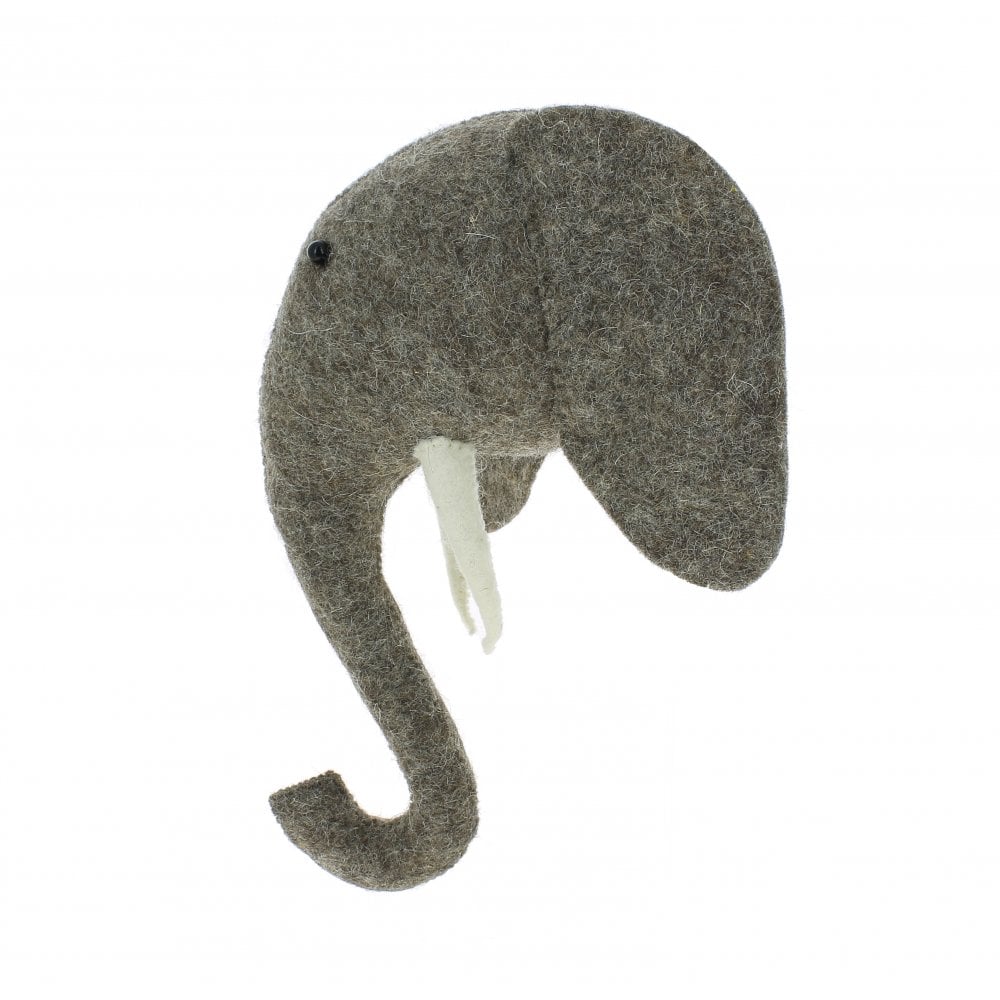 A handcrafted Handcrafted Felt Elephant with Tusks Wall Decor - Mini, featuring a prominent curved trunk and white tusks, against a white background.