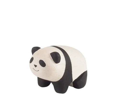 The Handmade Tiny Wooden Panda Child is a small, minimalist figurine crafted by Bali artisans from Albizia wood, with a white body, black ears, legs, and eye patches, and a simple smiling face set against a white background.