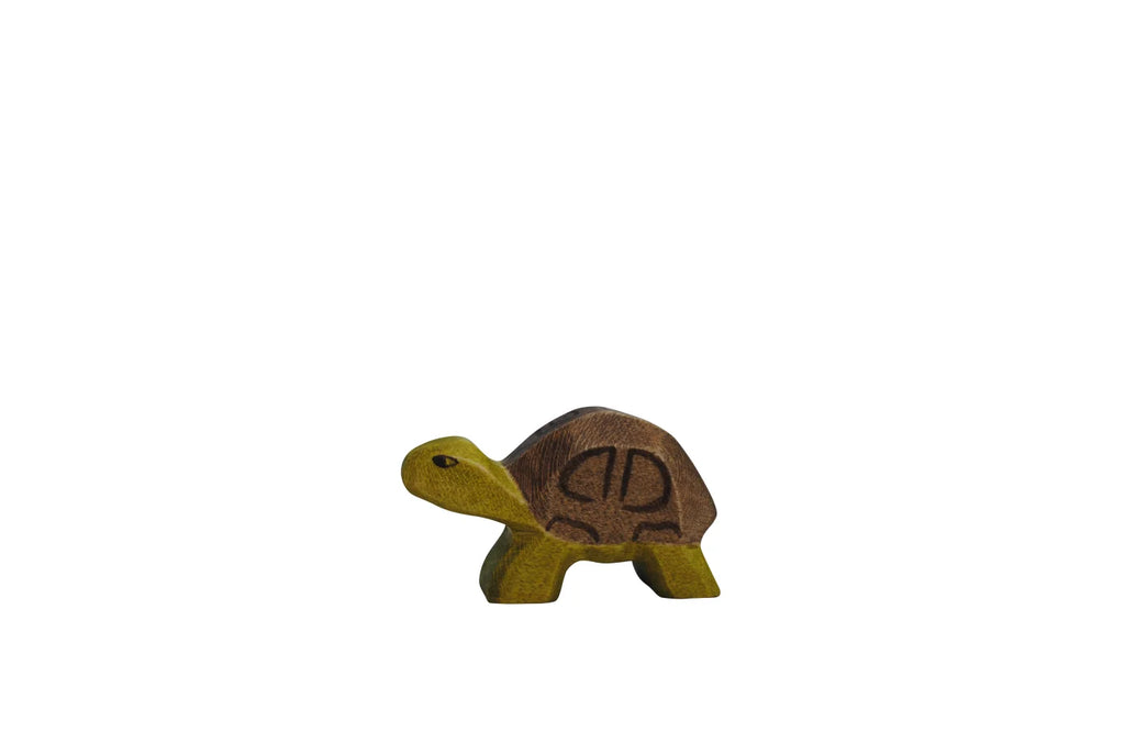 A small wooden turtle figurine from Handmade Holzwald Small Turtle with visible grain patterns, standing isolated on a plain white background.
