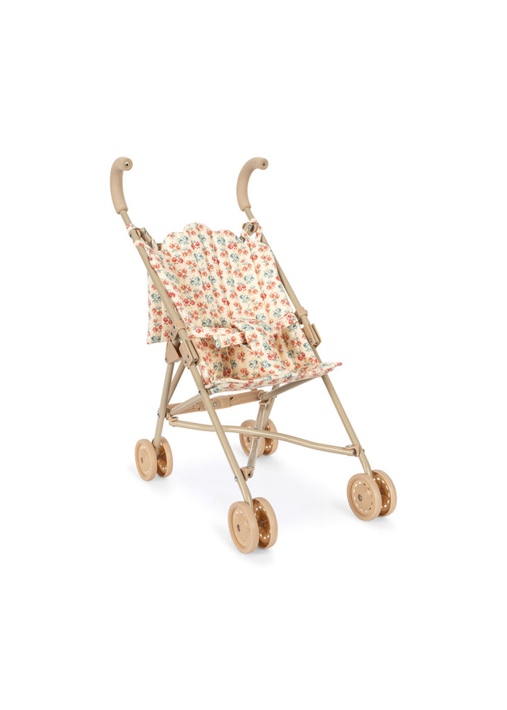The Konges Sloejd Doll Stroller - Lumina features a beige frame with curved handles, four sets of double wheels, and a floral-patterned seat in orange, green, and pink.