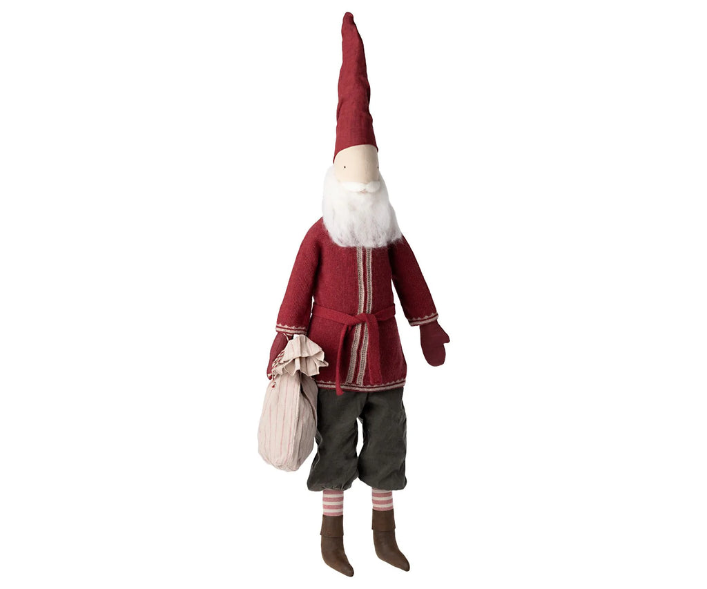 Meet the Maileg Large Santa, a delightful 43.30-inch fabric doll perfect for holiday decorating. It wears a long red hat, has a bushy white beard, and sports a cozy sweater under its traditional red coat. Completing the look with green pants, brown boots, striped socks, and mittens while holding a beige sack, it captures the festive spirit beautifully.