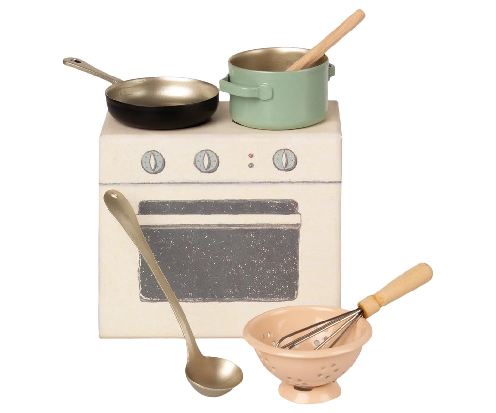 Miniature Maileg Cooking Set featuring a playful stove box with cooking pots, a frying pan, a colander with a whisk, and a ladle, all arranged on a white background.