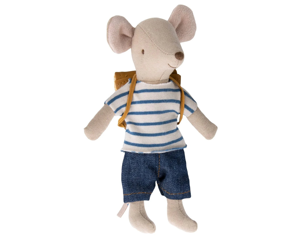 A Maileg Big Brother With Backpack dressed in a striped blue and white t-shirt, denim shorts, and a small brown school backpack, standing against a white background.
