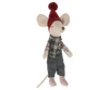 A Maileg Christmas Mouse - Big Brother wearing a red knit hat with a pom-pom, a plaid scarf, gray overalls, and a striped shirt. The mouse has a long tail and is standing upright. With its cozy, winter-themed outfit, this small friend adds festive charm to your seasonal decorations.