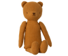 Sentence with product name: Plush Maileg Teddy Mum with a vintage look, featuring a simple, stitched face and elongated arms, isolated on a black background.