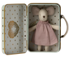A Maileg Angel Mouse in Metal Suitcase wearing a pink dress is nestled inside an open mint-coloured suitcase with a decorative interior. The suitcase has a pale exterior adorned with gold stars and a heart pattern. The mouse appears to be made of soft, textured material, like a tiny guardian angel.