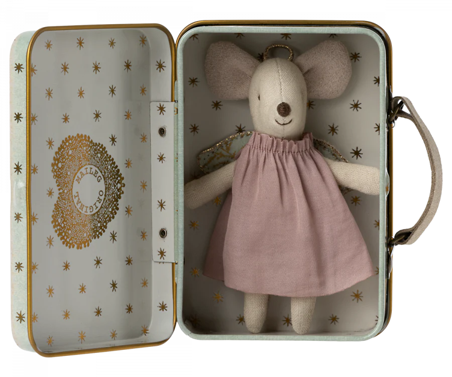 A Maileg Angel Mouse in Metal Suitcase wearing a pink dress is nestled inside an open mint-coloured suitcase with a decorative interior. The suitcase has a pale exterior adorned with gold stars and a heart pattern. The mouse appears to be made of soft, textured material, like a tiny guardian angel.