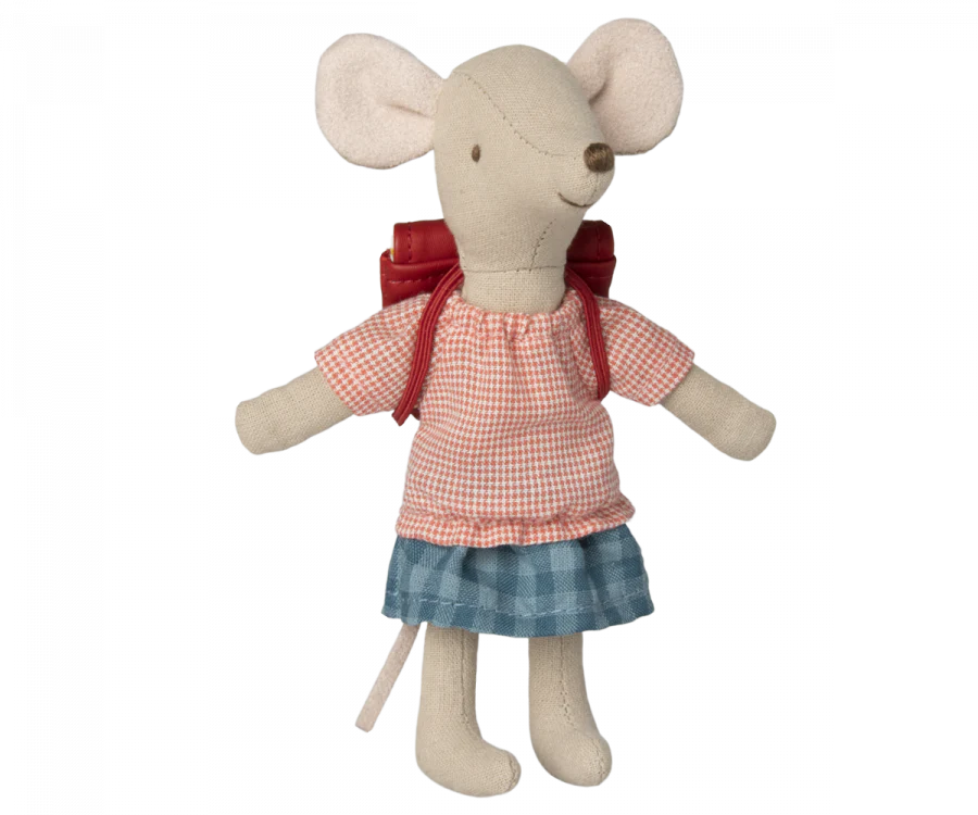 A Maileg Big Sister With Backpack - Red plush toy wearing a red and white checkered shirt, blue skirt, and standing upright against a black background.