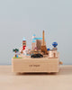 A Las Vegas Wooden Music Box featuring iconic global landmarks, including the Eiffel Tower and Las Vegas sign, creatively arranged on a platform with a "Las Vegas" label at the front.