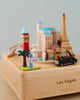 Las Vegas Wooden Music Box featuring unique culture landmarks and a "Welcome to Las Vegas" sign, set on a base labeled "Las Vegas" with a toy SUV and palm tree.