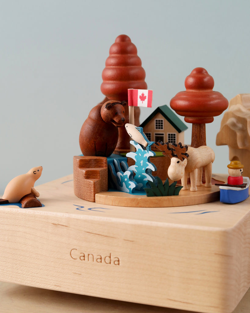 wooden music box with iconic Canadian scenery