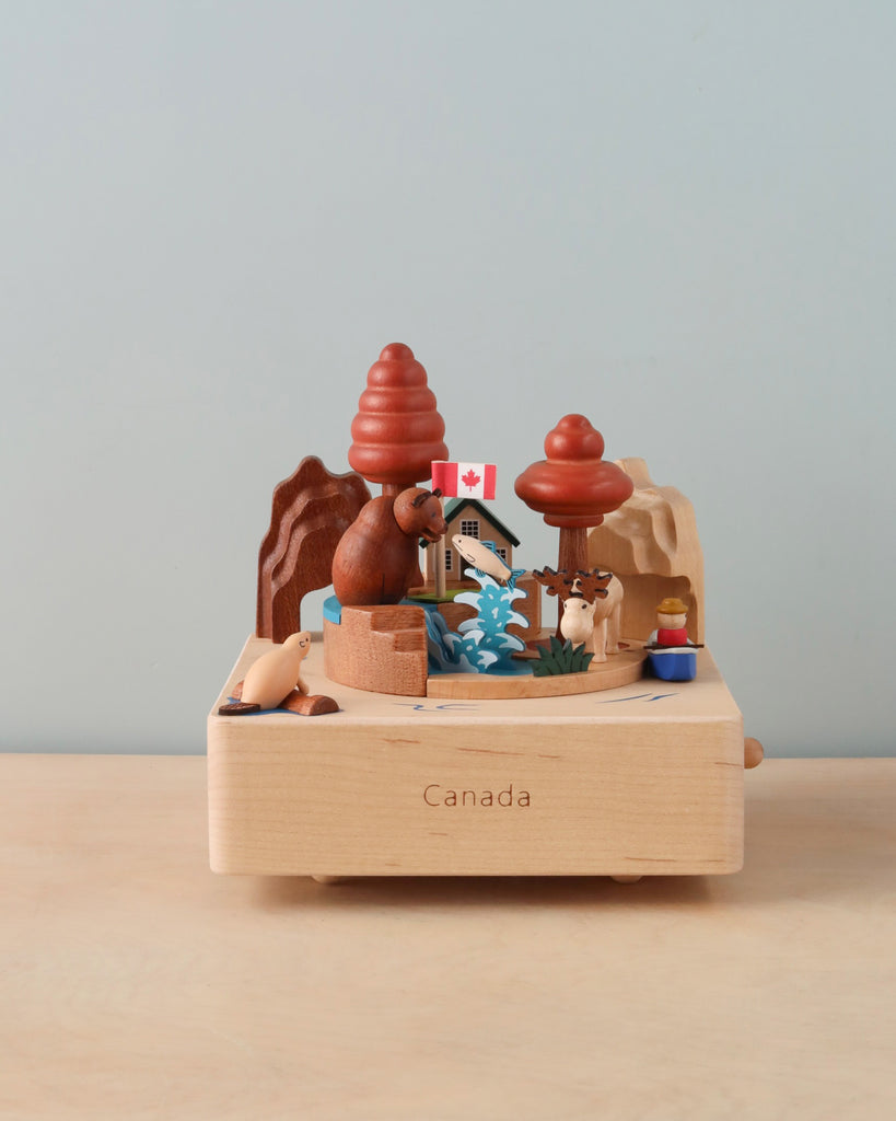 wooden music box with iconic Canadian scenery