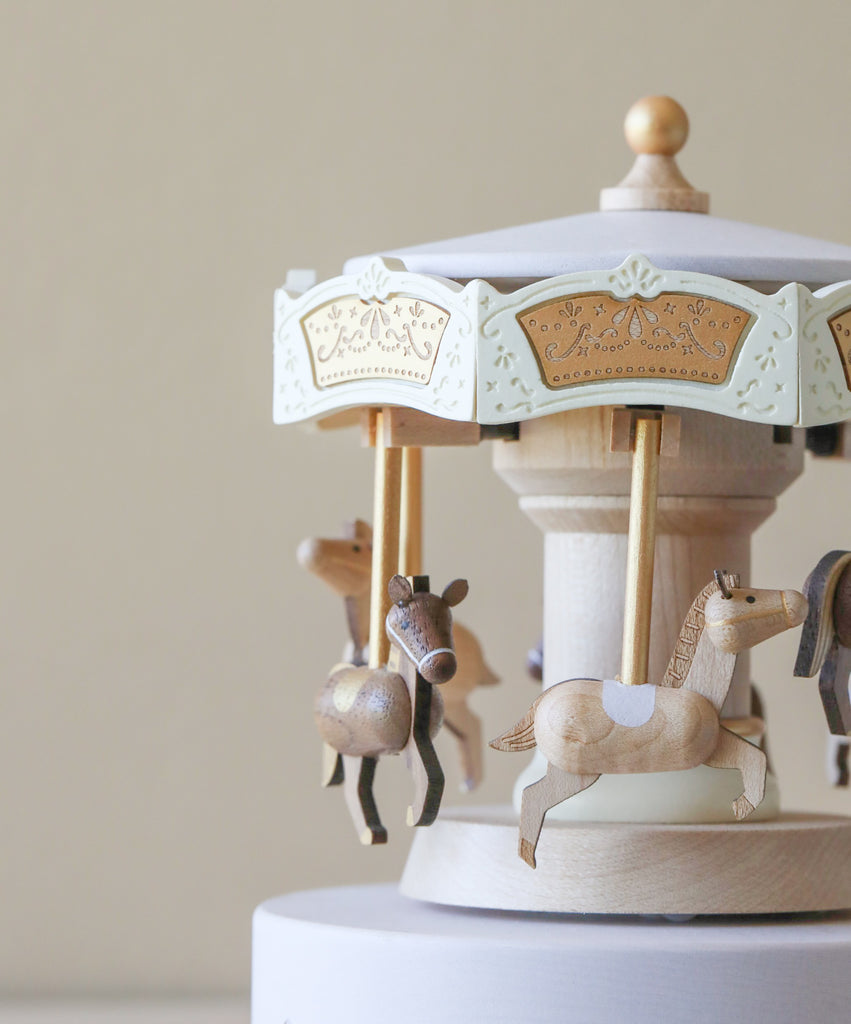 Close up image of the course music box, highlighting the detailed engravings on the product.