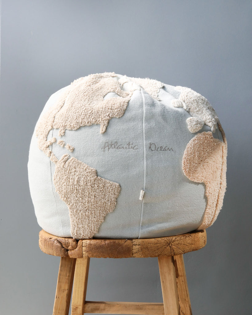 Globe shaped pouf
