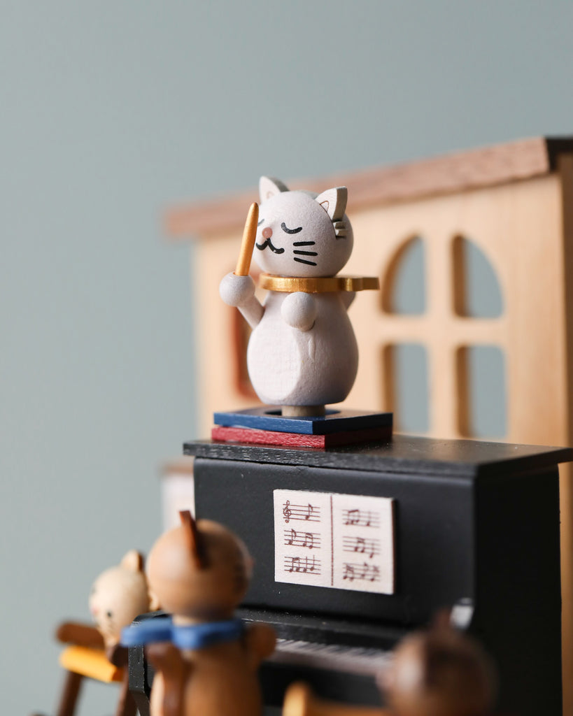 Wooden music box with cats playing the piano