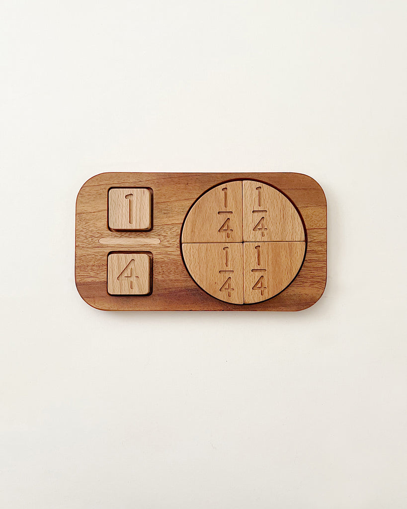 Wooden Fraction Puzzle - Made in USA tic-tac-toe game set against a plain background, designed as a visual learning tool, featuring x and o pieces stored neatly in compartments beside the playing grid.