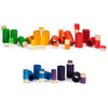 A collection of Grapat LA Non Basic Colors play set 36 pcs in varying sizes scattered on a white background. These educational toys are in shades of green, yellow, red, orange, blue, and purple.
