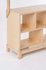 A light-colored wooden shoe rack with two shelves and a small label saying "Milton & Goose Market Stand" at the bottom. The rack is handcrafted in the USA, featuring a simple structure with visible screws.
