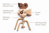 A non-toxic Father’s Factory wooden toy camera with labeled parts: spinning rewind lever, kaleidoscope viewfinder, spinning shutter, swivel lens, and a self-assemble wood tripod. Perfect for pretend-play activities.