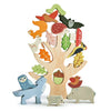 A colorful wooden Stacking Forest toy with various colored animals and leaf figures inserted into corresponding slots, standing against a white background.