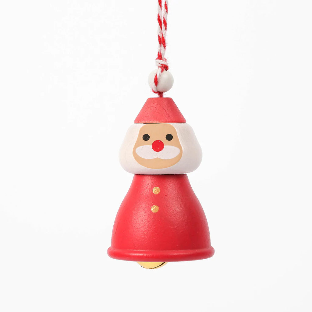 A Wooden Santa Ornament shaped like Santa Claus. The ornament, measuring 2 x 1.5 inches, features a red hat, white beard, rosy cheeks, and a red suit. Made of natural wood and adorned with a decorative bell, it is suspended by a red-and-white striped string.