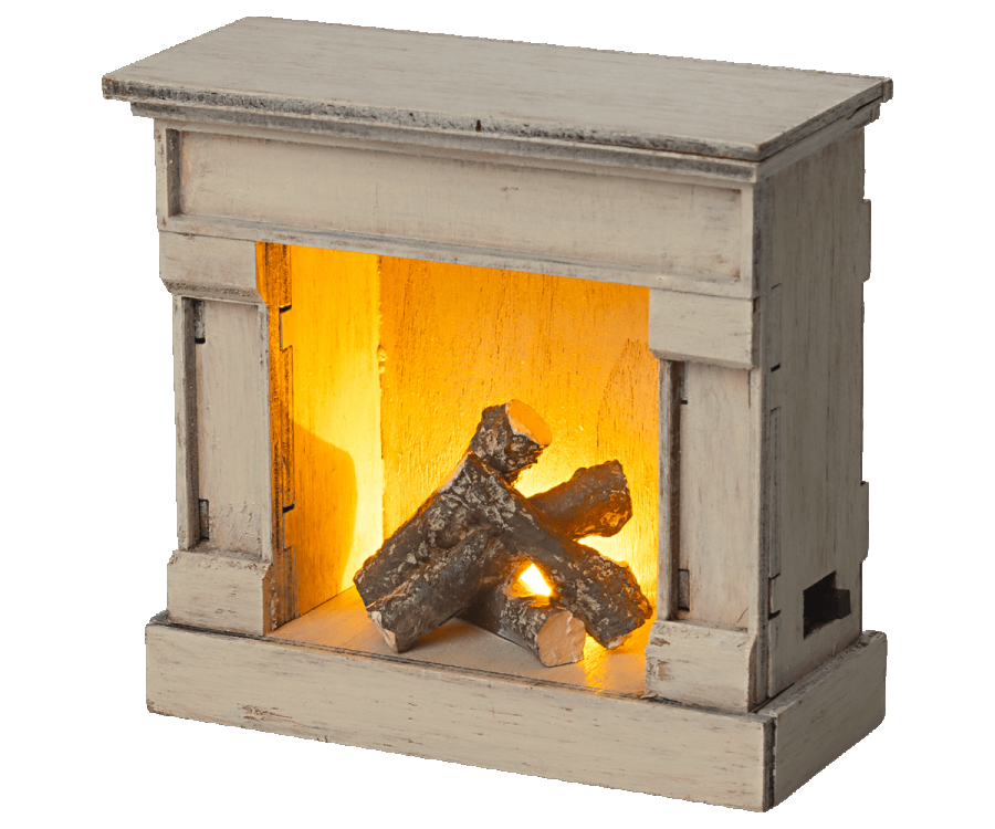 Off white fireplace with wood.