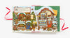 The illustrated children’s book "Christmas is Coming to Town!" shows snow-covered houses, festive trees, Brown Bear Wood animals, and Christmas lights. A text box reads, "Welcome, friend, to Christmas Street..." framed by red ribbons.