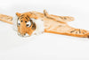 The Costume - Tiger is a plush tiger rug with a soft head, faux fur, and flat body. It features cartoon stripes and expressive eyes, making it perfect for completing any animal-themed costume or play area.
