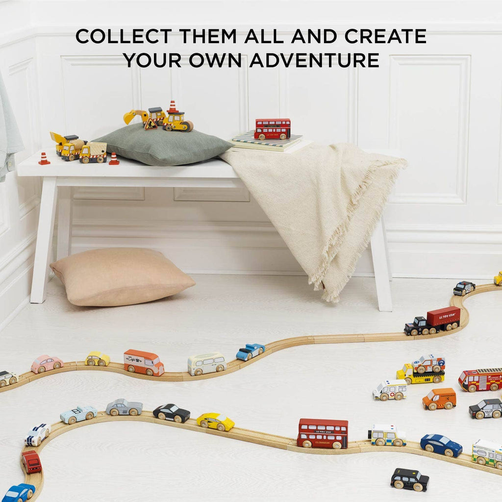 Vintage Toy Cars are arranged on the cozy floor beside a bench, cushions, and blanket. Text above reads: "Collect Vintage Toy Cars and create your own adventure.