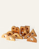 A set of twelve Bauspiel Mirror Blocks, 12-Piece Set, featuring wooden building blocks in various shapes each with a circular mirror insert.