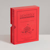 The red, bookshelf edition game box for Monopoly Junior Vintage Bookshelf Edition features illustrations of a carnival tent and a man running, with text indicating it is for ages 5 and up for 2 to 4 players.