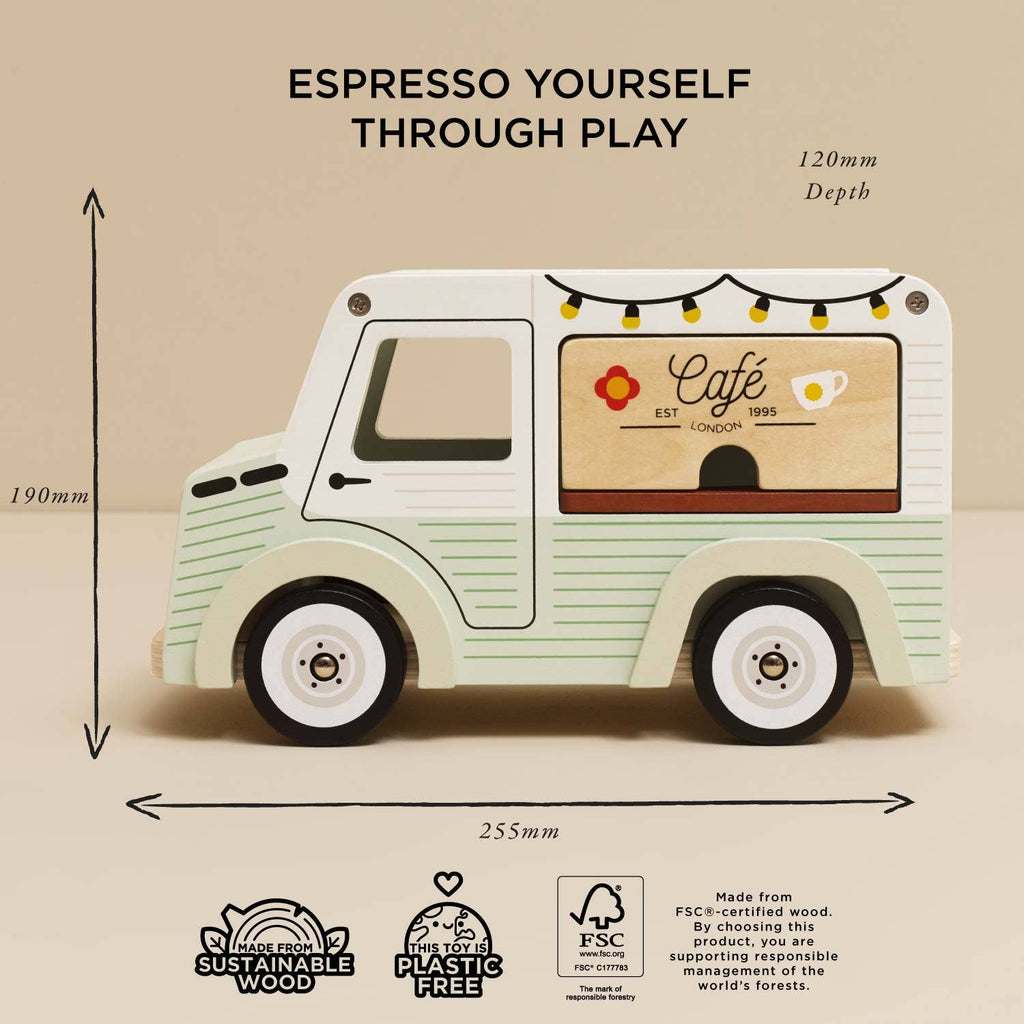 The Mobile Café Van, made from FSC-certified wood and painted pastel green and white with coffee-themed illustrations, measures 255mm x 190mm x 120mm. Ideal for imaginative play and includes sustainability icons.