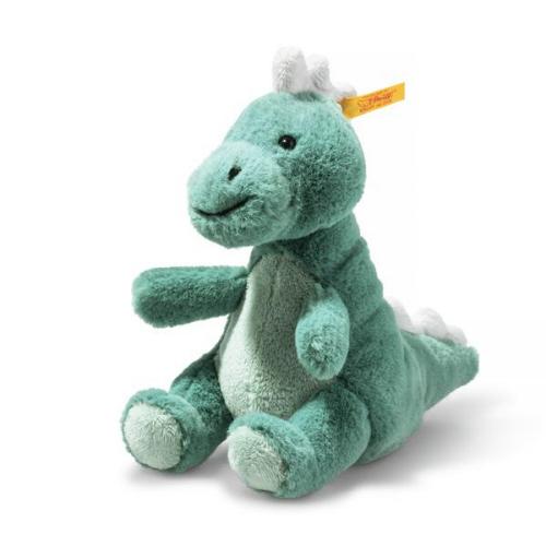 The Steiff Joshi Baby T-Rex Dinosaur is a soft, green plush toy featuring a white belly, white spikes along its back, and a yellow tag on its head. This adorable baby dino sits upright against a white background—making it the perfect prehistoric toy and cuddly friend for any little one.