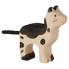 The Holztiger Cat, Ragdoll is a handcrafted wooden toy with black and brown spots, a smiling face, and a braided black tail. Made in Europe, it stands on all four legs and is part of the HOLZTIGER figures collection.