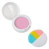 Open compact of Klee Naturals Makeup Kit - After the Rain- Rainbow Dream light pink powder blush next to a handheld makeup brush with tricolor pink, yellow, and blue bristles.