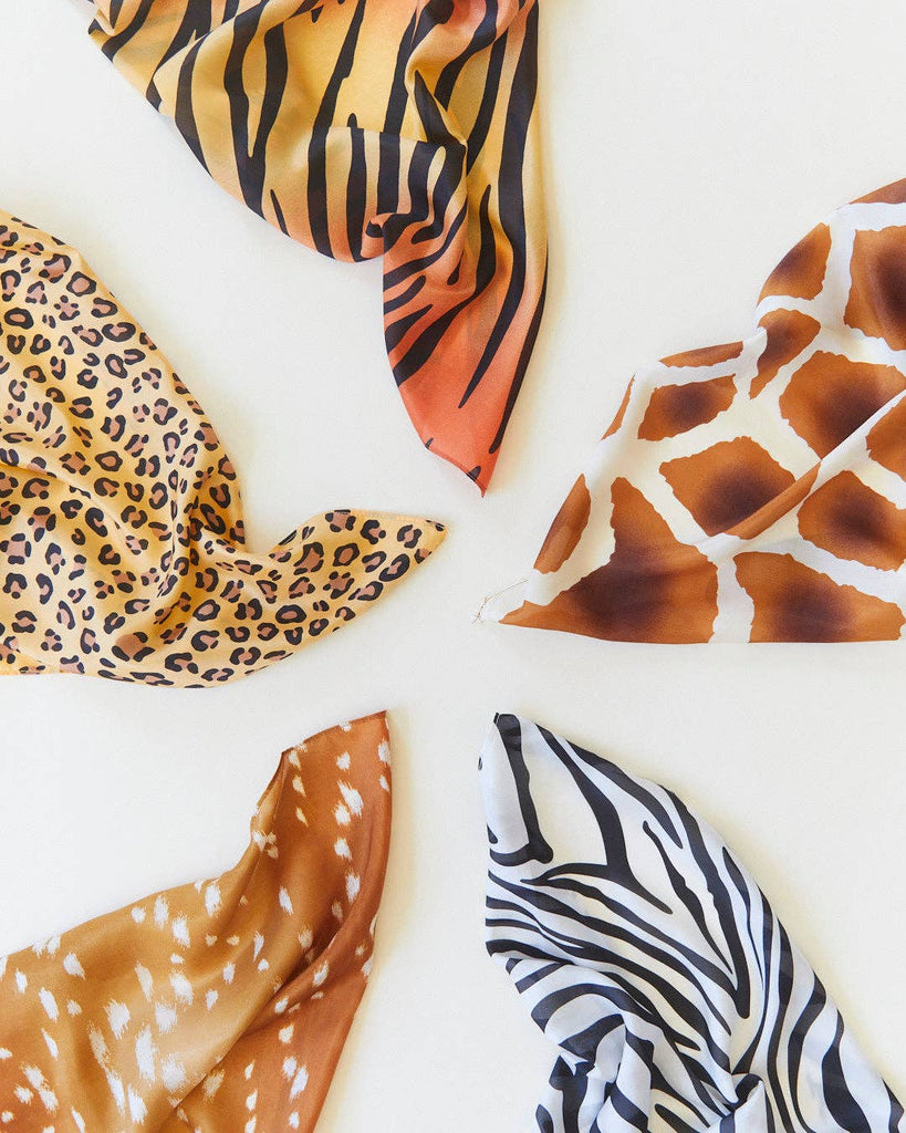 Sarah's Silks Animal Print Playsilk - Fawn is a pure silk toy featuring a deer-inspired pattern. Perfect for imaginative play and ideal as a Waldorf toy, it's great for open-ended creativity.