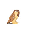 The Handmade Wooden Little Owl is a handcrafted figurine made from sustainable hardwood with brown, beige, and white details, finished in natural plant-based stains, displayed on a white background.